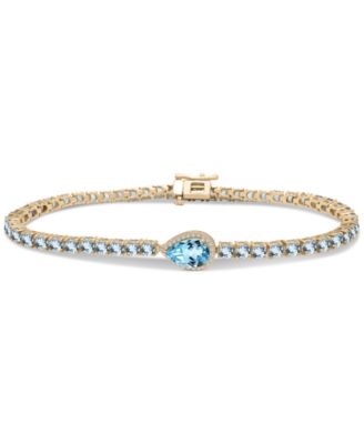 Macy's - Blue Topaz (8-3/8 ct. t.w.) & Diamond (1/10 ct. t.w.) Halo Tennis Bracelet in 14k Gold-Plated Sterling Silver