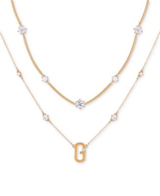 GUESS - Gold-Tone Crystal & Textured Logo Layered Pendant Necklace, 16" + 2" extender